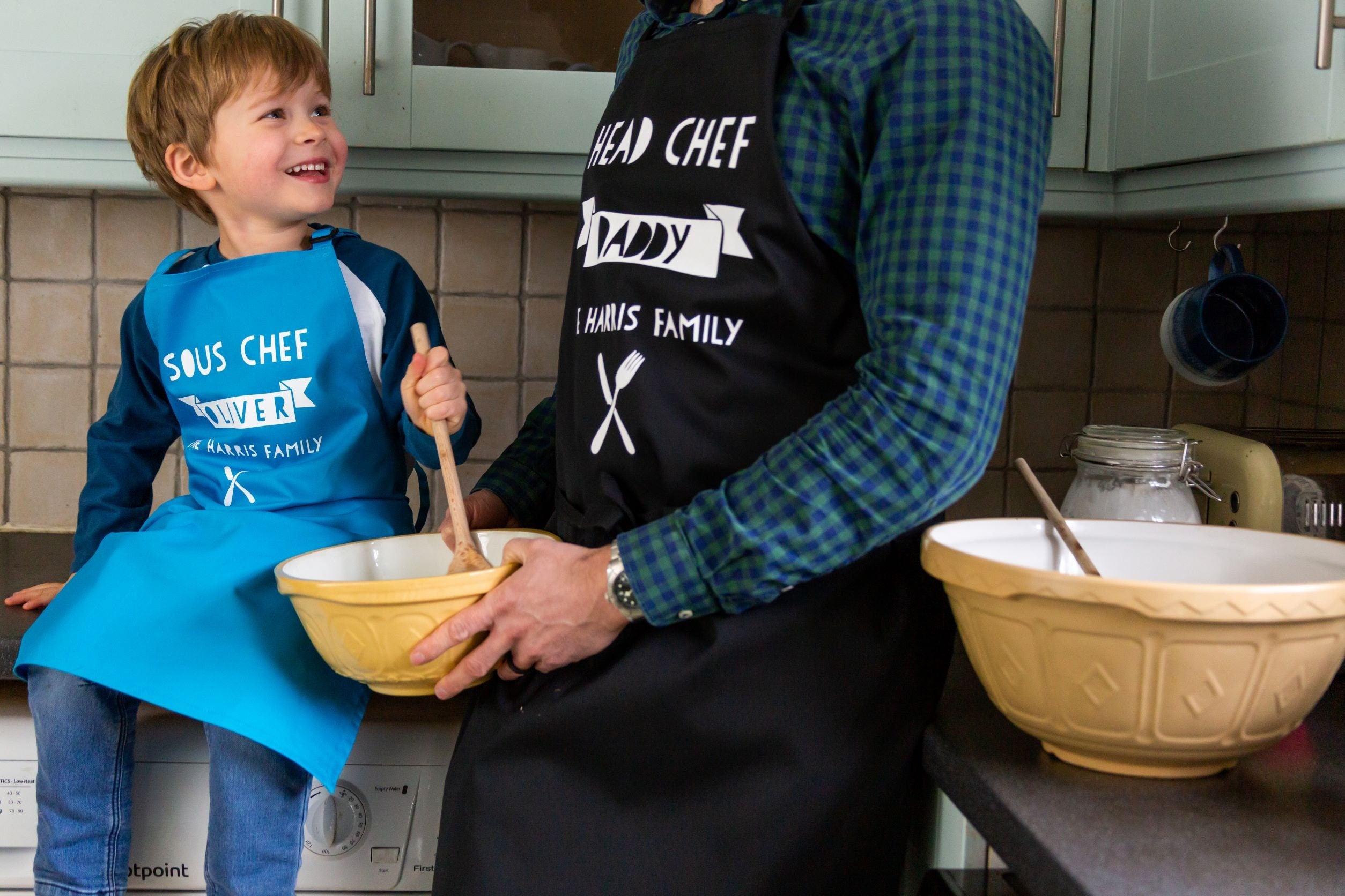 Daddy and store daughter cooking aprons